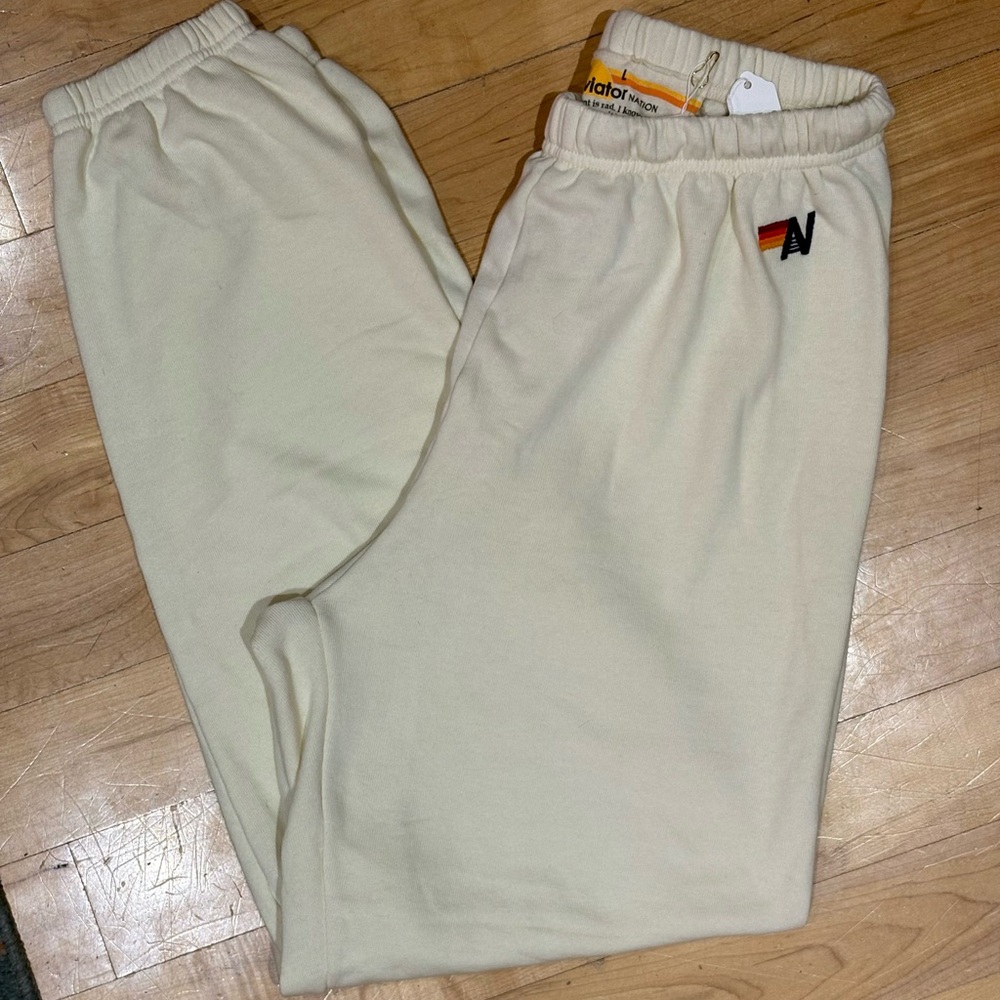NWT Logo sweatpants. Vintage white